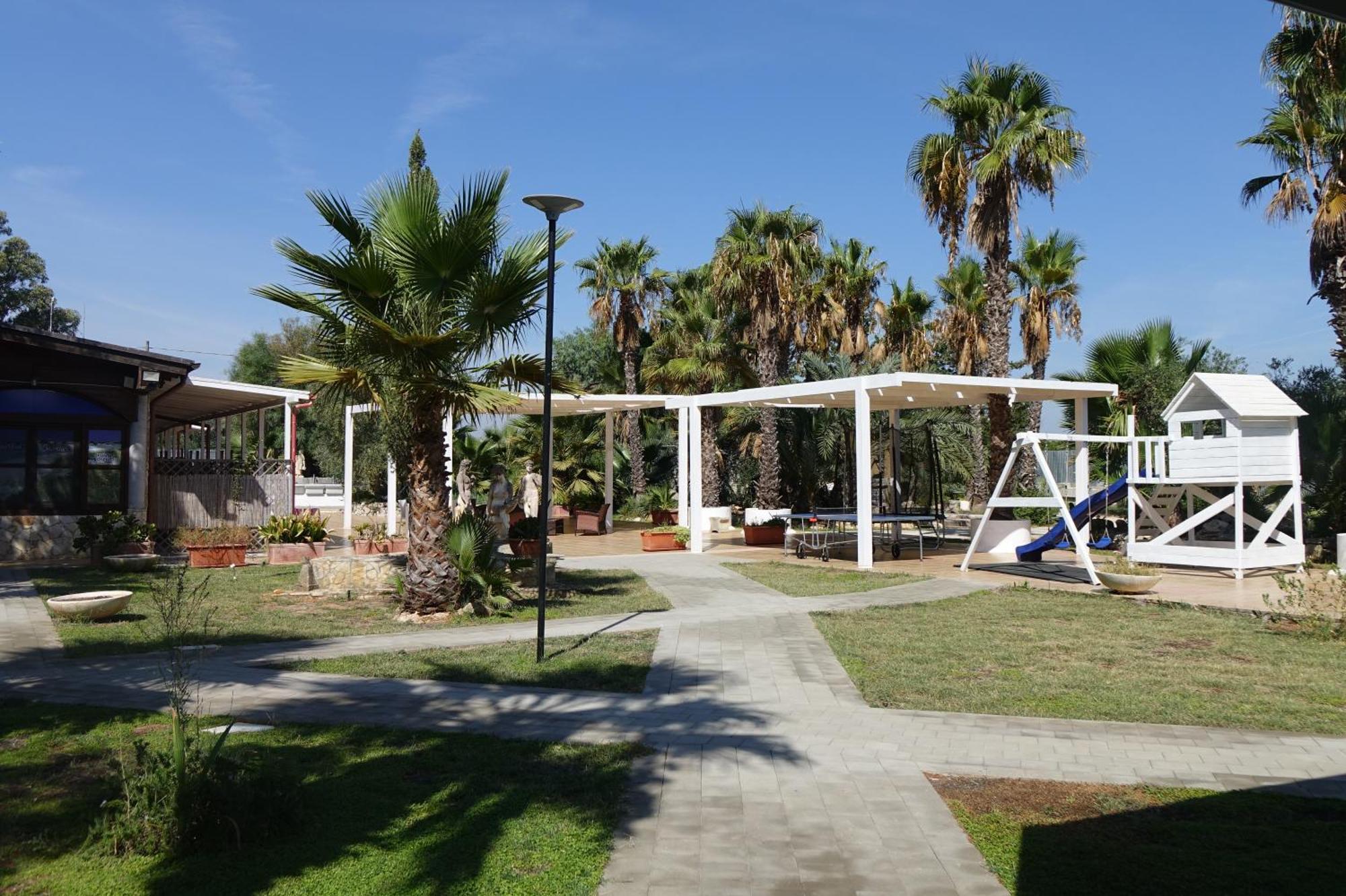 Giardini Sausari Residence Punta Prosciutto Esterno foto