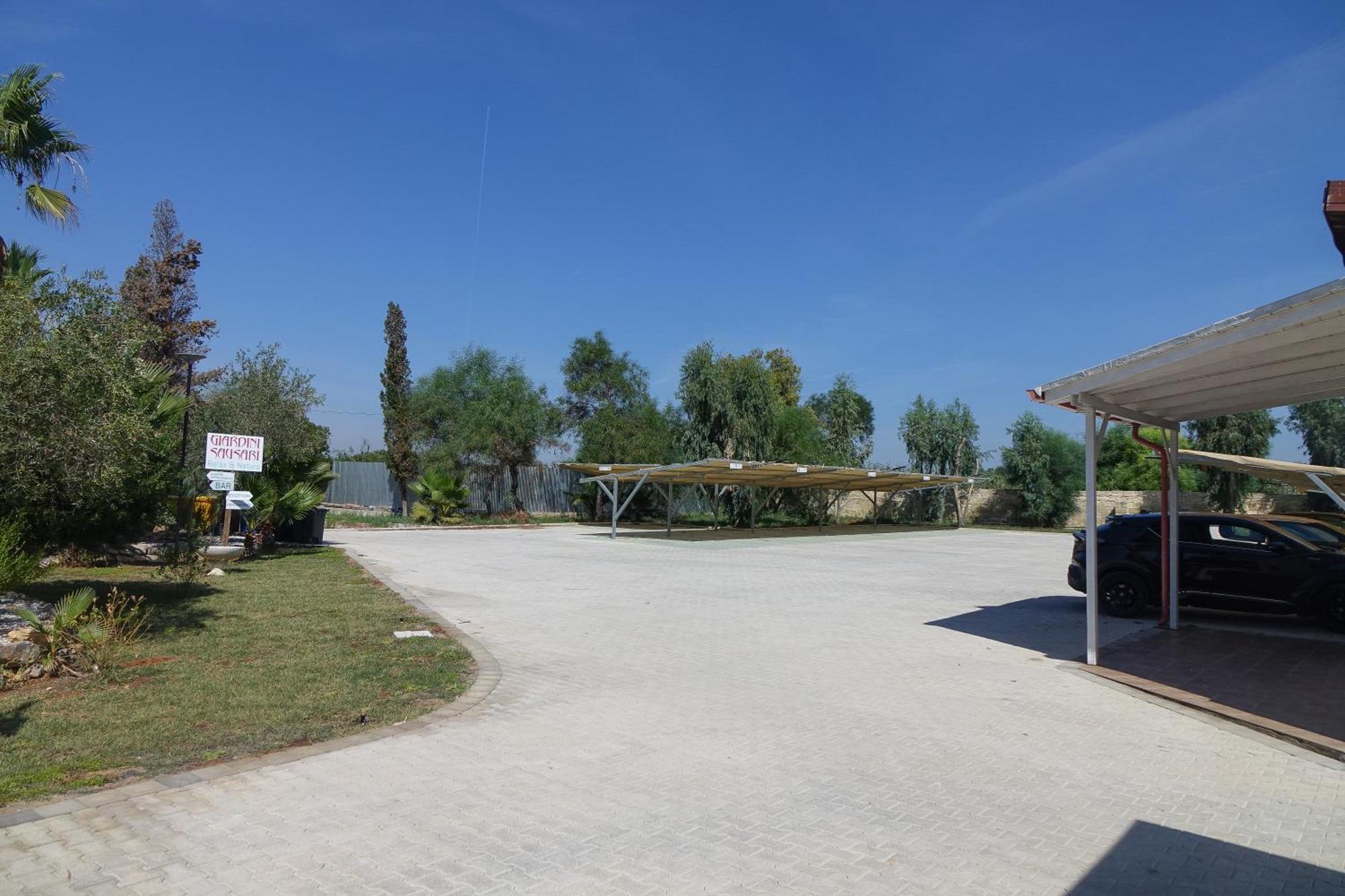 Giardini Sausari Residence Punta Prosciutto Esterno foto